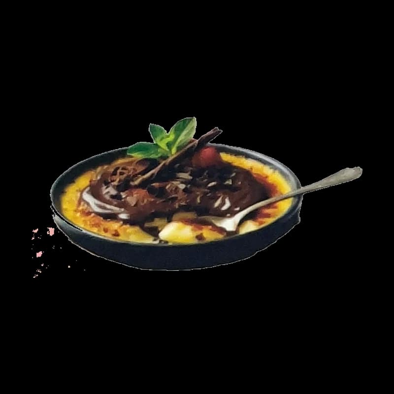 Crème brûlée nappée de sauce chocolat et de menthe fraîche